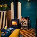 cosy cabin with a real fire for digital detox glamping in sussex